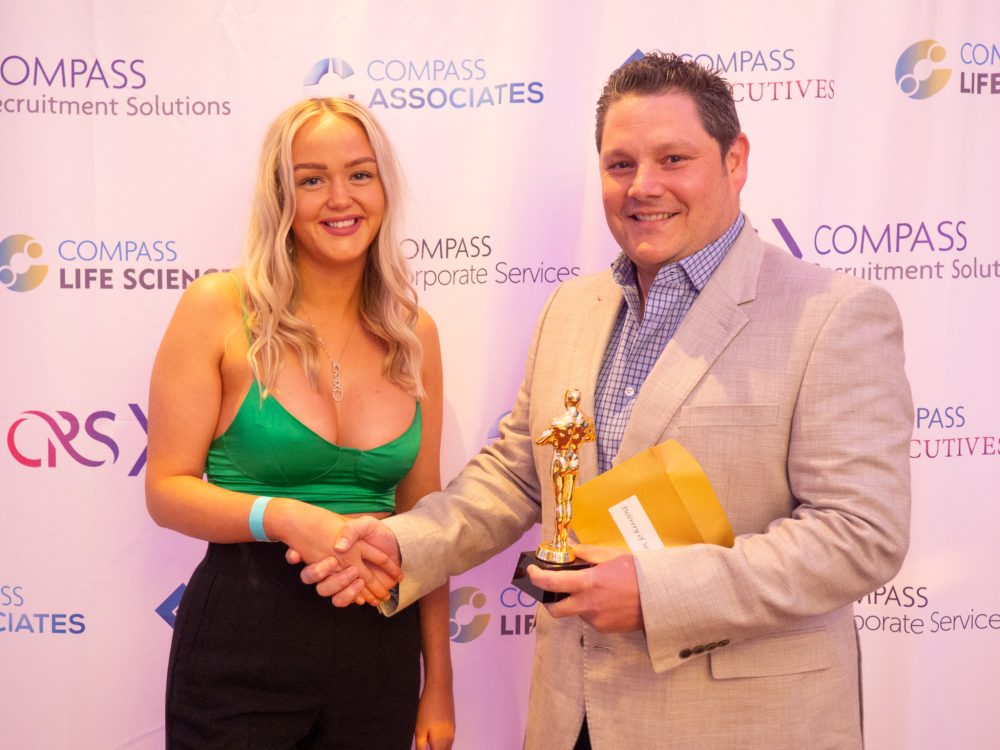 Lily Bulbeck and Mike Jeffreys pictured holding the Delivery Service CRS Core Values Award