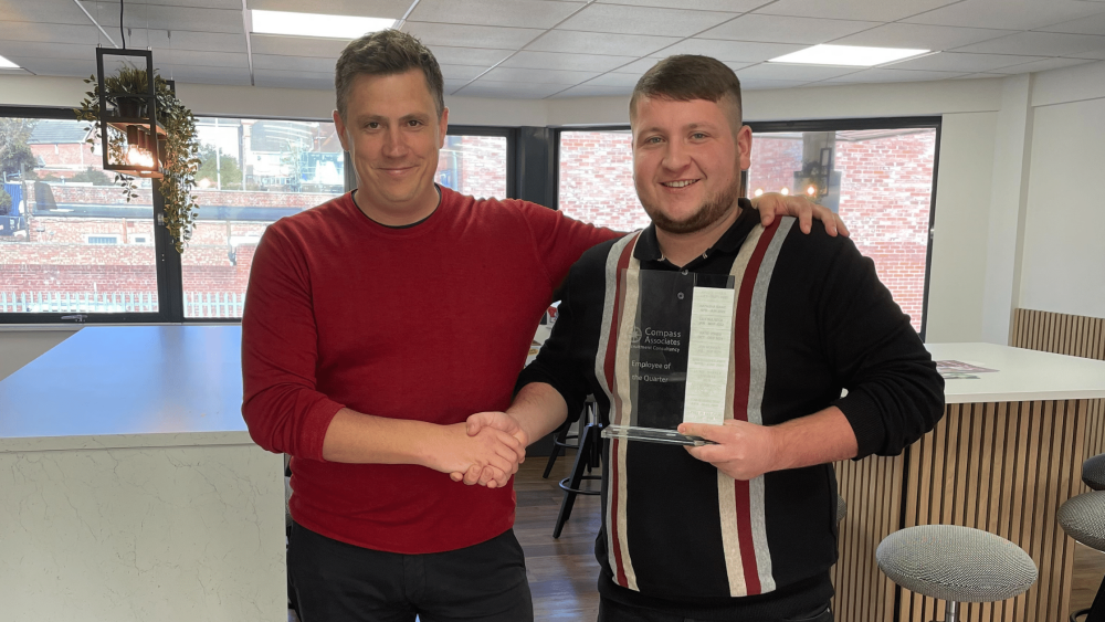 Harry Oakey - being awarded Employee of the Quarter by Group Managing Director Sam Leighton-Smith