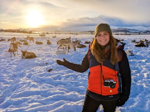 Izzy Pearson - landscape image of Izzy featuring sunset, snow and reindeers